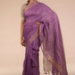 A picture of Mauve Bloom Linen Saree in Dark Purple, womens workwear standing against a grey background