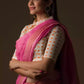 A beautiful lady in Pretty Pink Plain In Pure Linen Saree, a office wear for women