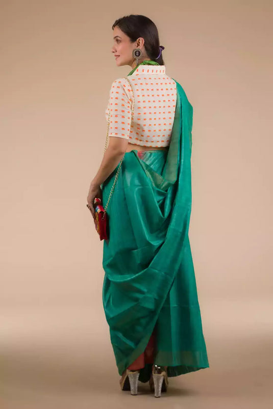This is view from back of Sea Green and Red Border Plain In Pure Tussar with Ghicha Border Saree, formal office wear for women