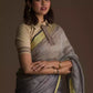 Aesthetically pleasing picture of a lady in Grey Silk Linen Jamdani hand weaving Saree