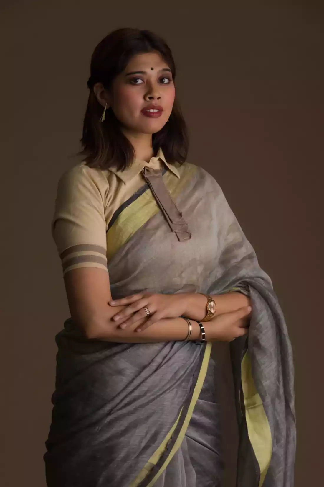 Aesthetically pleasing picture of a lady in Grey Silk Linen Jamdani hand weaving Saree