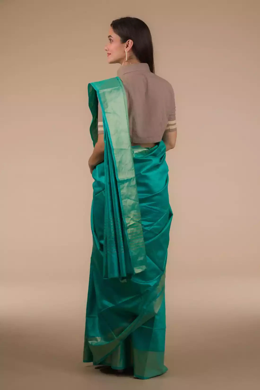 This is view from back of Sea green In Tussar by Munga Saree, formal office wear for women