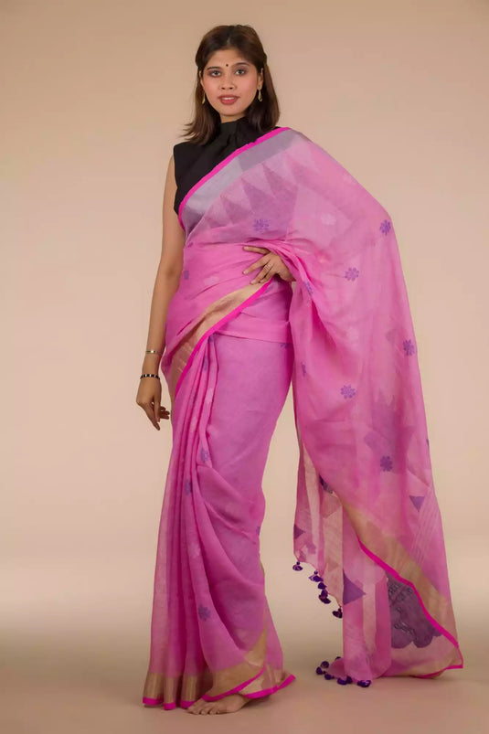 A beautiful lady in Dark Pink Jamdani hand weaving In Pure Linen Saree, a office wear for women