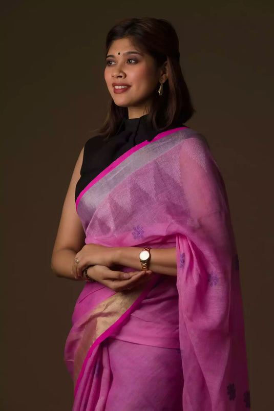 Aesthetically pleasing picture of a lady in Dark Pink Jamdani hand weaving In Pure Linen Saree, womens workwear