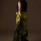 back look of a beautiful woman with long hairs wearing a multicolor saree with black blouse, flaunting loose end of her saree