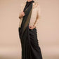 A picture of Indy Ebony Linen Saree in black, womens workwear standing against a beige background